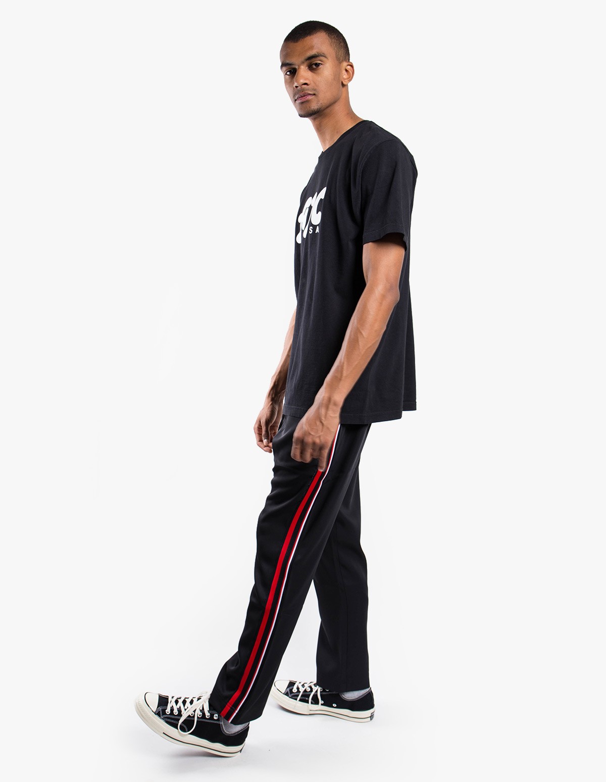 CMMN SWDN Buck Track Pants in Black / Red